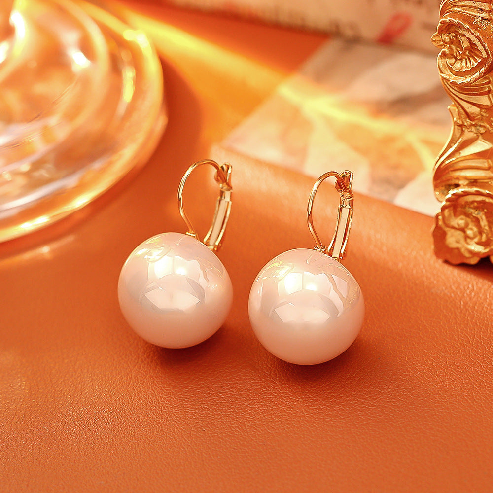 珍珠誇張耳環－商品主圖｜https://igowo.tw/