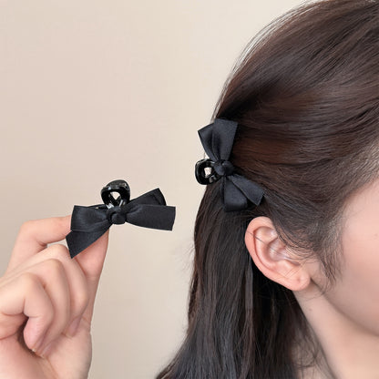 黑色蝴蝶結小巧鯊魚夾－商品主圖｜https://igowo.tw/