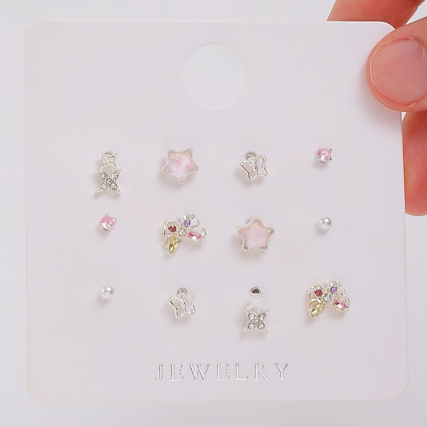 粉色蝴蝶耳釘－細節特寫5｜https://igowo.tw/