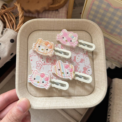 粉色貓咪波浪髮夾－商品主圖｜https://igowo.tw/