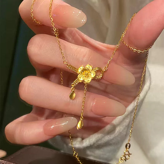 金色鈦鋼花朵流蘇項鍊－商品主圖｜https://igowo.tw/