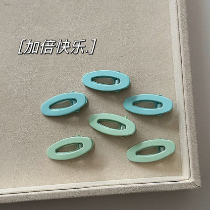 藍色金屬橢圓簡約髮夾－商品主圖｜https://igowo.tw/