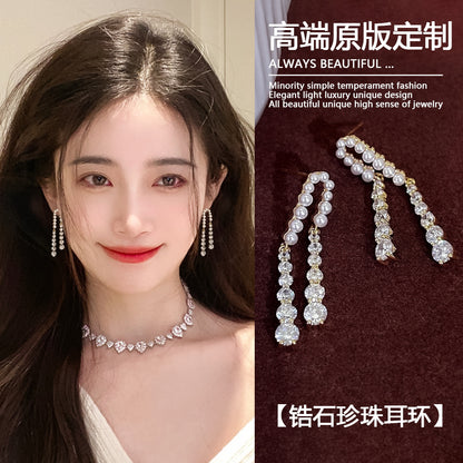 珍珠流蘇鑲鑽耳環－商品主圖｜https://igowo.tw/