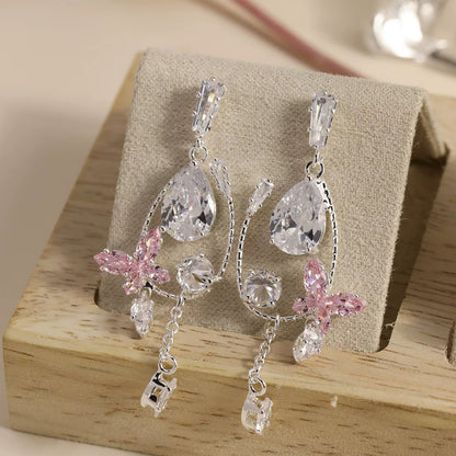 金色鋯石蝴蝶流蘇耳釘－商品主圖｜https://igowo.tw/